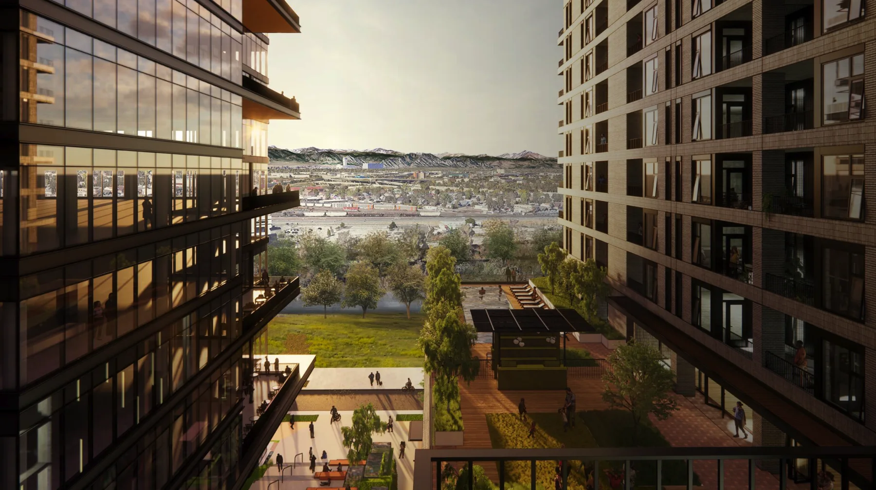 Rendering of the Hurley Place courtyard between two towers, looking west over the rail yards to the Front Range at sunset