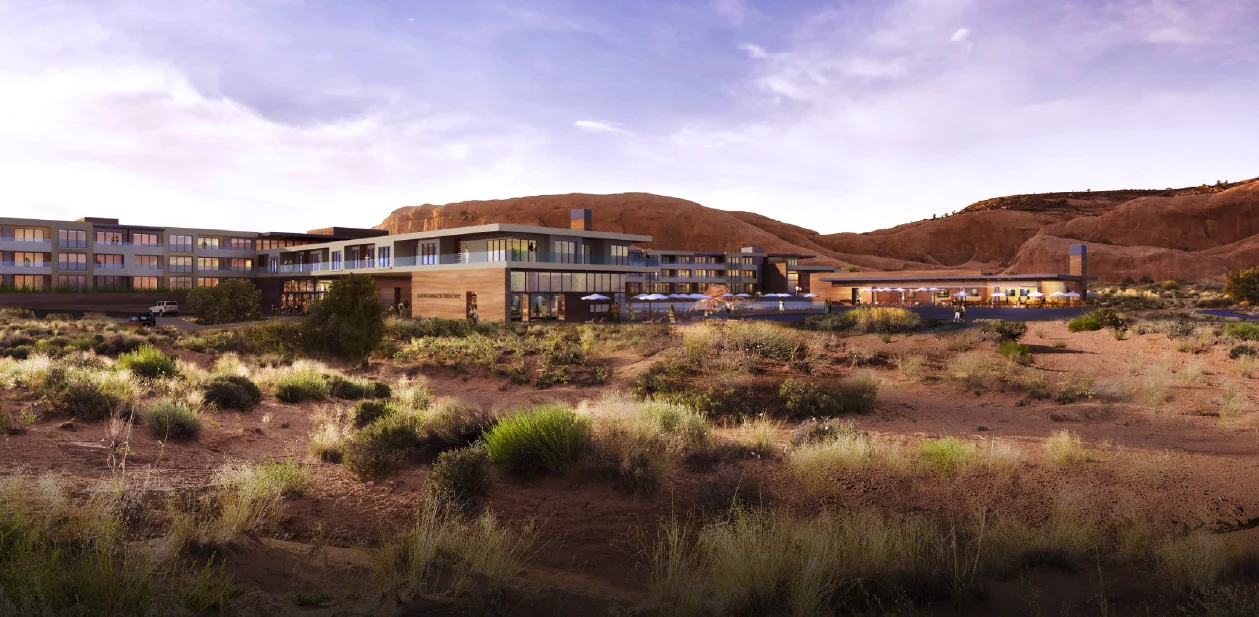 Rendering of the Lionsback lodge: low timber and glass buildings with terraces and umbrellas under a red sandstone cliff, desert scrub in the foreground
