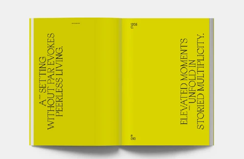 Open book spread, yellow pages with vertical serif headlines: A setting without par evokes peerless living